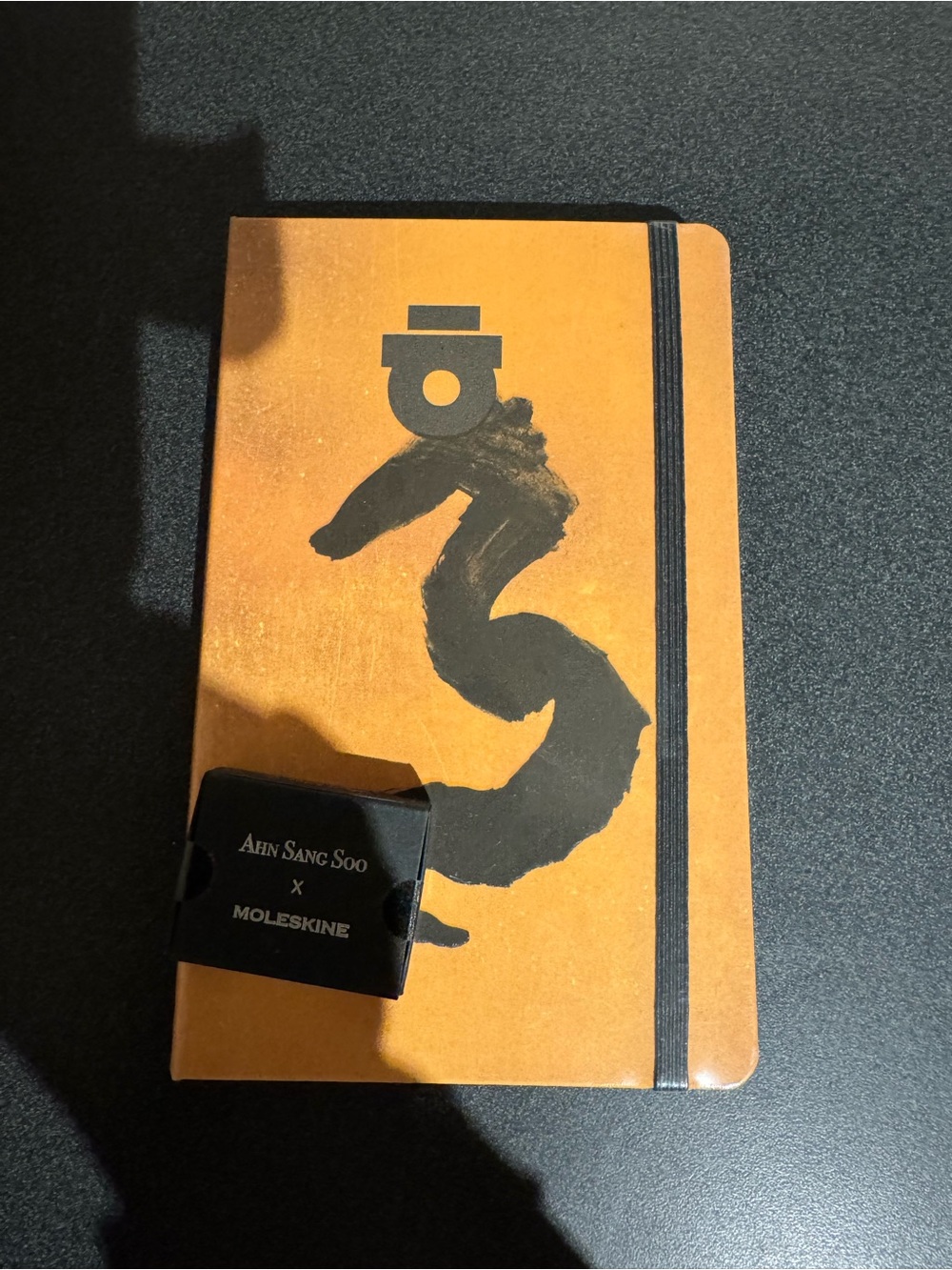 Ahn Sang Soo x Moleskine Limited Edition Orange Notebook and decorative pin